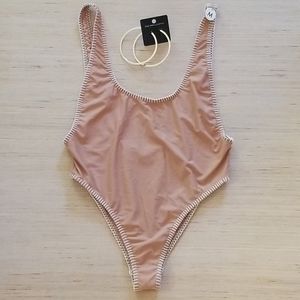 Nude one piece bathing suit